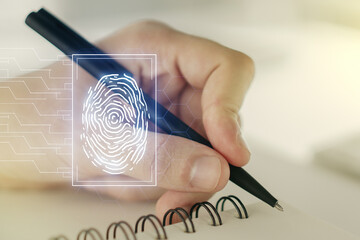 Multi exposure of abstract graphic fingerprint sketch with man hand writing in diary on background, fingerprint scan data concept