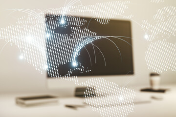 Double exposure of abstract digital world map with connections on laptop background, research and strategy concept