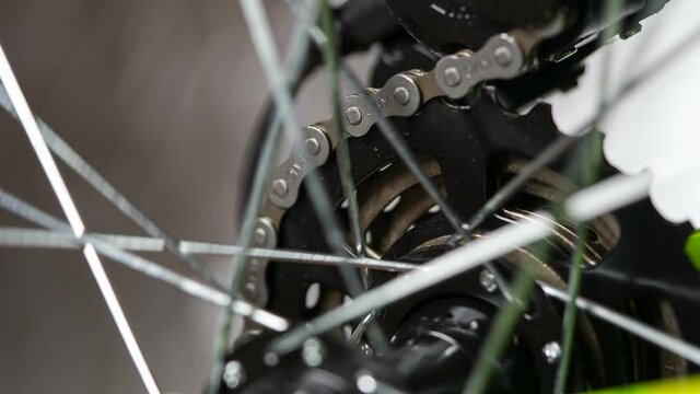 Lubrication of the Bicycle Mechanism. The bicycle chain rotates the gears. The mechanism rotates the wheel. Filmed at a speed of 120fps