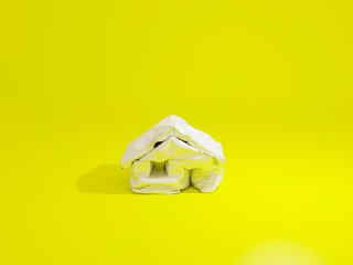 Melted or deflated house with icon shape isolated in a yellow background