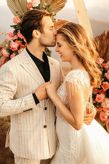 Loving happy couple hugging tenderly in beautiful clothes, romantic relationship