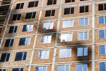 scaffolding on a building wall. building getting a new paint.