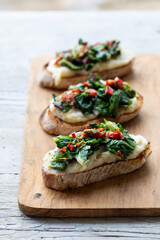 Crostini with white bean and potato puree and Swiss chard