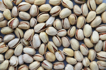 Pistachio background. Top view. Concept: healthy food.Selective focus