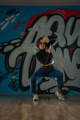 Fototapeta na wymiar Young beautiful hiphop dancer. Dance off concept.