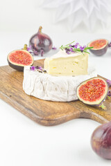 Camembert cheese with rosemary and fresh figs