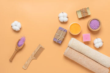 Beautiful spa composition on a pastel yellow background. Body care cosmetics. Top view, flat lay. Health and beauty concept.