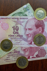 Turkish lira bill with coins