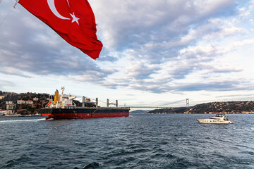 A cargo ship passes through the Bosphorus Strait in Turkey