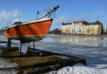 boat on the shore of the bay in Helsinki, Finland