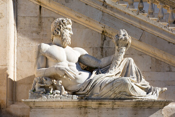 Statue of Tiber River God (Tiberinus) on Capitoline Hill on Piazza del Campidoglio, Rome, Italy