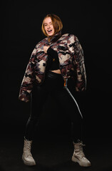 Fashionable young woman, studio fashion shot