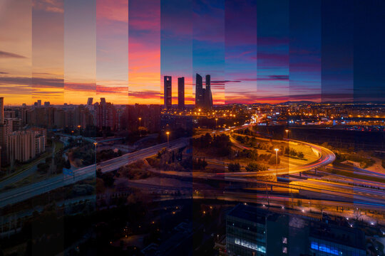 Contemporary skyscraper and multistory house exteriors against roadway and shiny light posts in Madrid at sunset