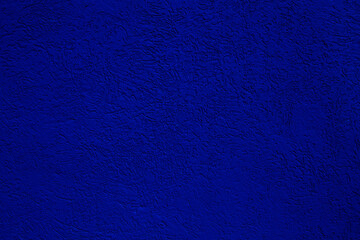 texture of blue wall covered with volumetric plaster, space for text, space for copy