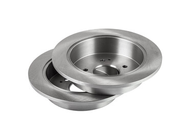 a set of brake discs lies one on top of the other, gray steel car spare parts isolated on white background.