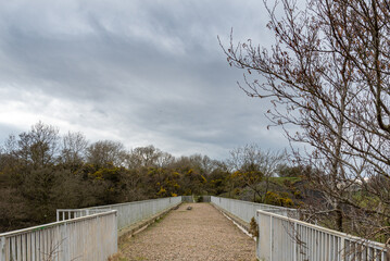 Fototapeta premium The Top or walkway on Laigh Milton Viaduct which is thought to be one of Scotlands oldest railway viaducts.