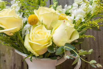 Close up of yellow rose in flower bouquet (selective focus)