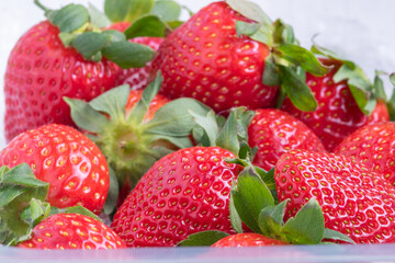 Fresh strawberries close-up shot. Red strawberries background.