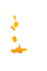Appetizing pieces of ripe dried apricots on a white background
