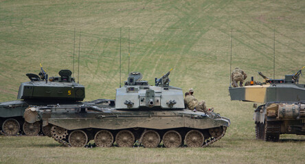 the crews from british army Challenger II 2 FV4034 main battle tanks take a well earned break from a military exercise, Wiltshire