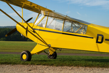 Light, yellow and popular utility aircraft
