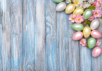 Easter background Colorful eggs pink spring blossoms