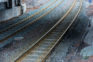 Naklejka premium Tram tracks running under a road viaduct.