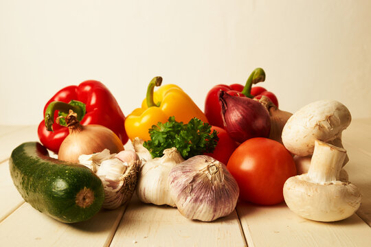 Variation of fresh and tasty vegetables on wooden table for dinner 