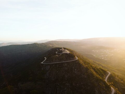 Aerial sunrise panorama of mountain hill top church chapel Sanctuary Nossa Senhora da Granca in Mondim de Basto Portugal