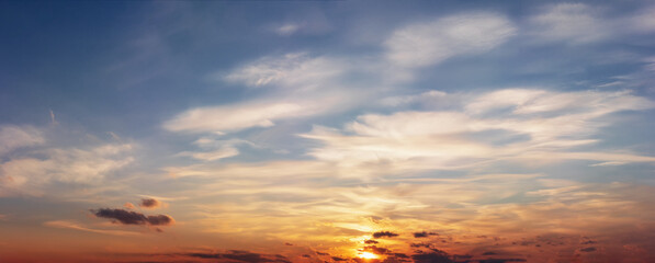 Naklejka na ściany i meble Colorful sunset sky with beautiful clouds.