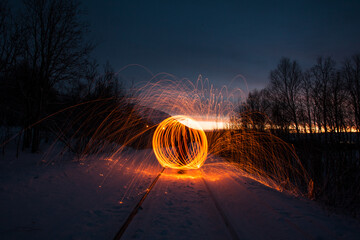 Fire painting at winter at night