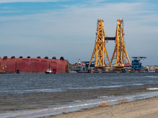 St Simons Island, GA USA - March 23 2021: Disassembly of Golden Ray cargo ship in the St. Simons...