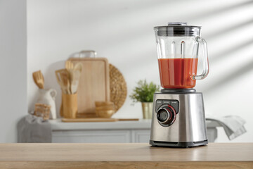 Blender on the kitchen table in the sunshine of spring 