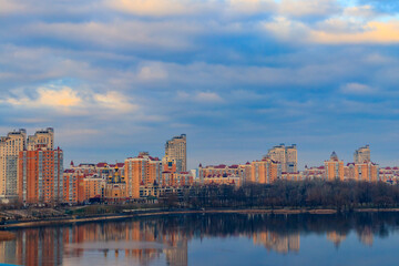 Obraz premium View of Obolon embankment of the Dnieper river and church of the Nativity of Christ in Kiev, Ukraine