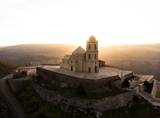 Aerial sunrise panorama of mountain hill top church chapel Sanctuary Nossa Senhora da Granca in...