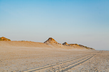 Fototapeta na wymiar Dunes and Beach on Ocean Background