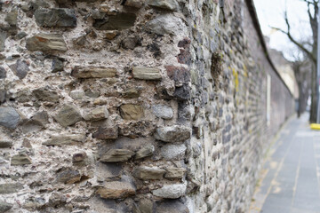 details of a historical roman wall in the old town of cologne