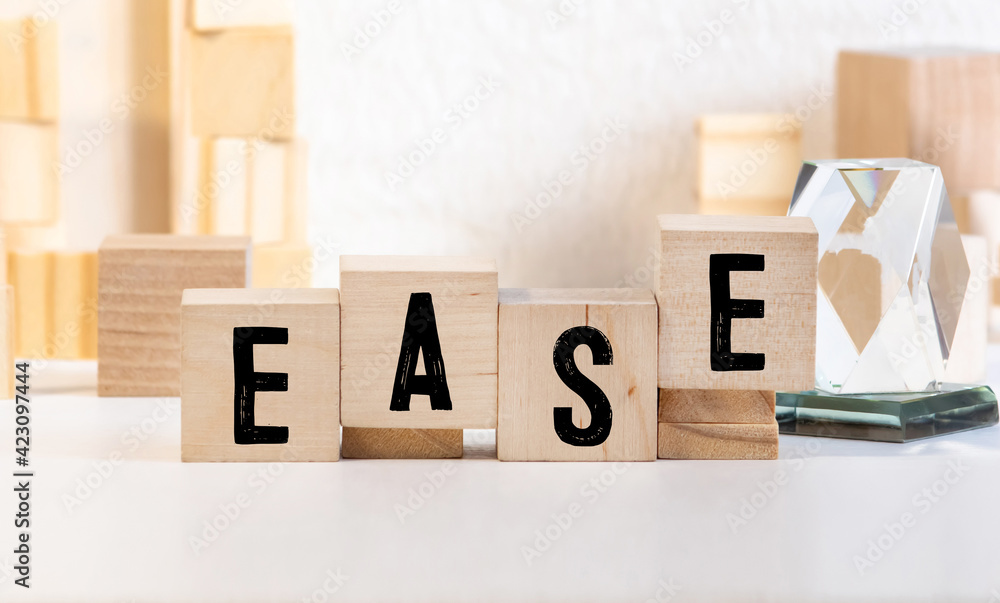 Poster ease word made with building blocks isolated on white