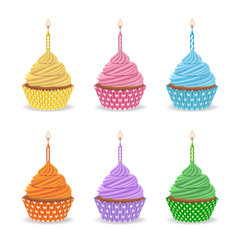 set of birthday colorful cupcakes with candles