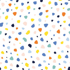 Abstract hand drawn dots and irregular shapes randomly placed seamless repeat pattern. Multicolor confetti like all over print with whitebackground.