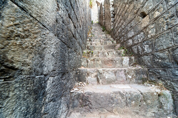 Narrow stone staircase leading up to St John's Fortress,Kotor , Montenegro,Eastern Europe.