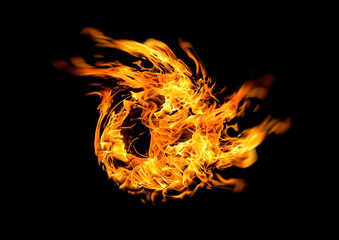 暗闇に渦巻く火の抽象的な背景