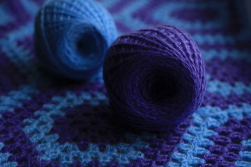 Plaid crocheted from blue and lilac threads