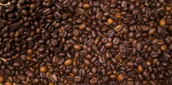 Coffee beans as background picture - top down view - food photography