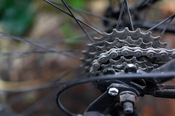 detail of bicycle chain and cassette, bicycle concept with selective focus