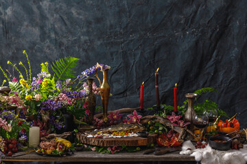 Still life in old masters style with fish, glass of wine, old dishes, fruits. The concept of a...