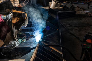 Gas metal arc welding. It is a welding process in which an electric arc forms between a consumable wire electrode and the workpiece metal, which heats the workpiece metal, causing them to fuse.