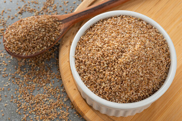 Bowl with flour for kibe. Detail of wooden spoon and bamboo holder.