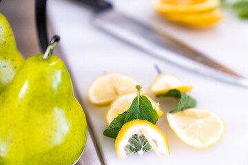 lemon and pear fruit on a plate