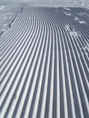 interesting traces of stripes in the snow